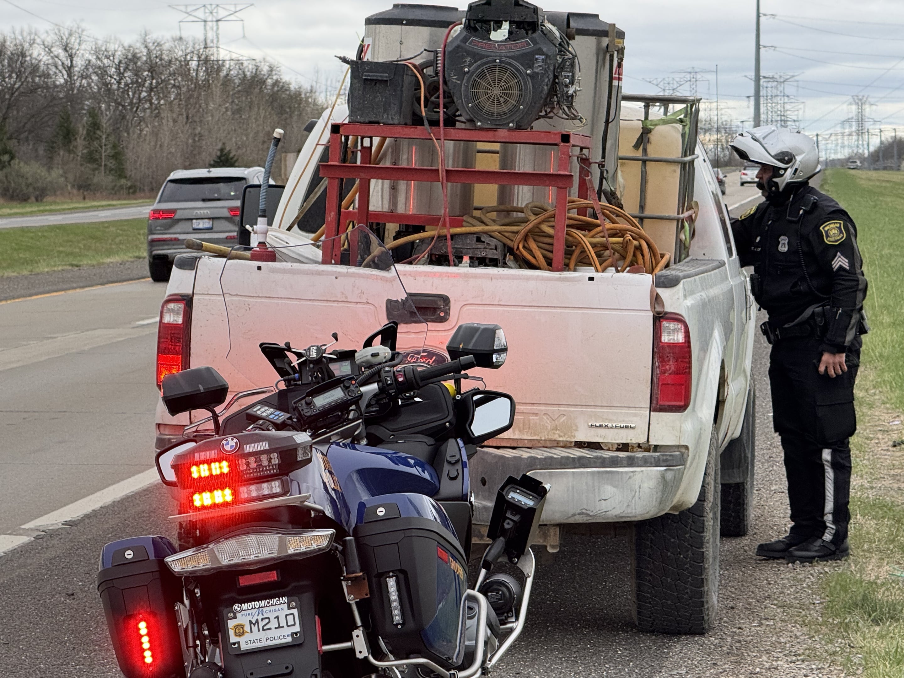 A driver is stopped by a Michigan State Police Trooper during Operation Ghost Rider on April 26, 2025.